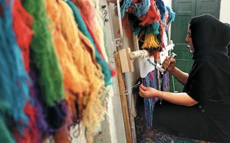 Since opening in 1997, the factory has trained many women to become professional carpet weavers. Photo: Rudaw