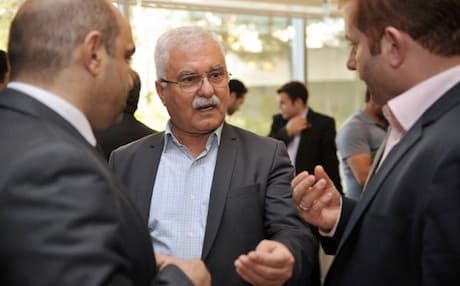 President of the Syrian National Council (SNC) George Sabra, center, talks with other Syrian opposition members during a meeting in Istanbul, on 25 May 2013. Photo: AFP