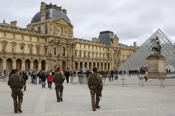 This file photo shows French police on patrol. French authorities have foiled a plot by four would-be extremists to attack military bases, the interior minister said Wednesday. Photo: AP.
