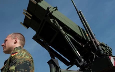A German soldier next to a missile battery. AFP Photo.