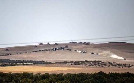 Free Syrian Army fighters and Turkish Army tanks moved last Wednesday toward the border to Jarabulus. AP photo