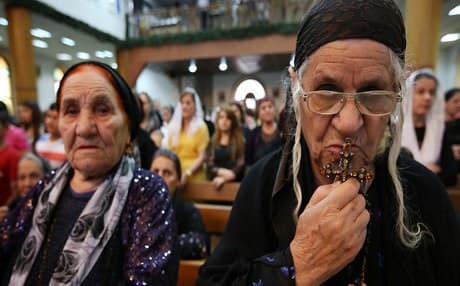 Iraqi Christians during a mass at the Saint-Joseph church in Erbil. AFP file photo.