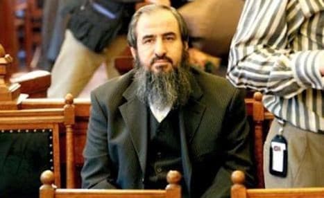 AP file photo of Mulla Krekar in court in Norway.