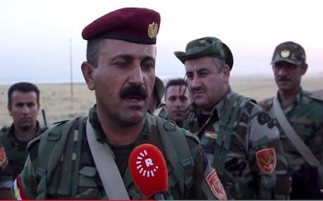 A Peshmerga officer speaks to Rudaw near Shangal.