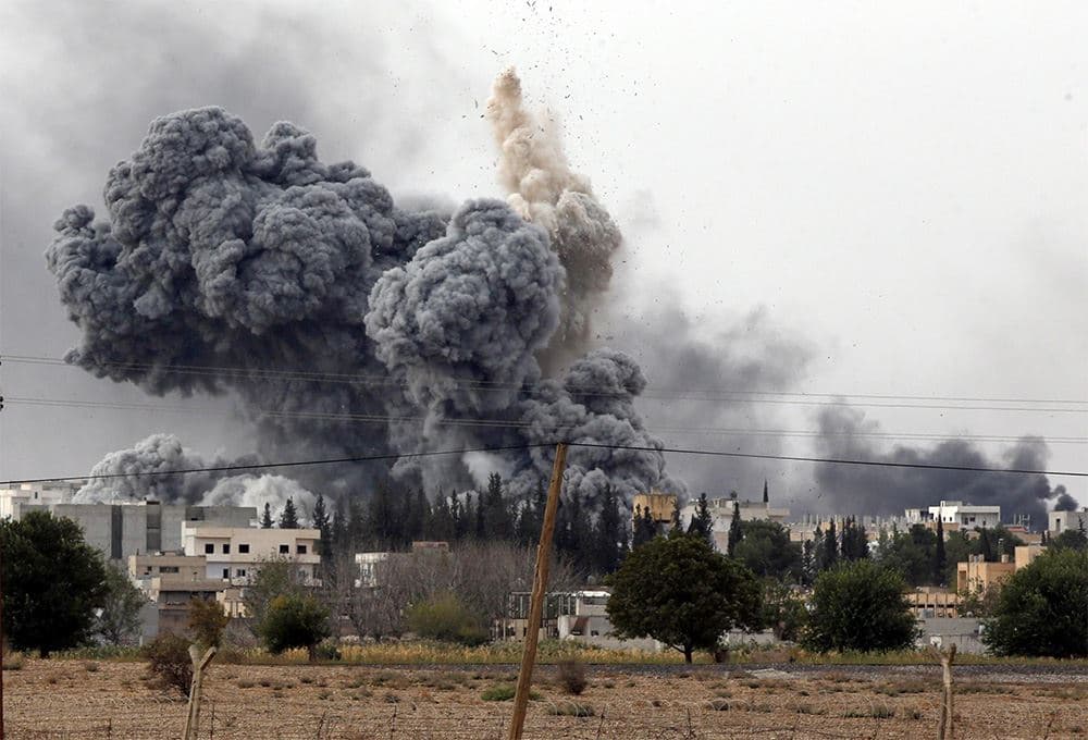 US-led coalition airstrikes hit a number of positions in Kobane beginning late Saturday night. Photo: AP