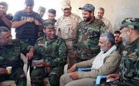 Qasem Soleimani (seated right) is reported to have directed the fighting for Jalawla and Saadiya.