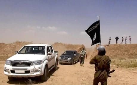 ISIS fighters dismantling the Syria-Iran border. Photo: ISIS media.