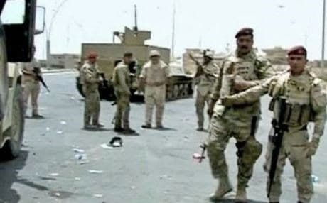Iraqi forces retreating from Mosul following the ISIS onslaught in June. Photo: AP.