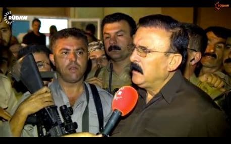 File photo of Sangawi speaking to reporters.