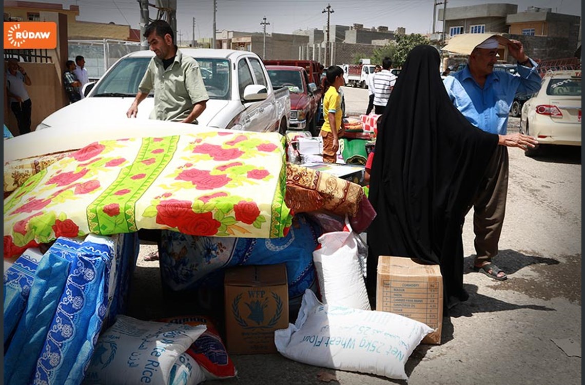 بەڕێوەبەری رێکخراوی کۆچ و کۆچبەران یارمەتی بەسەر ئاوارەکانی موسڵ دابەشدەکات 19