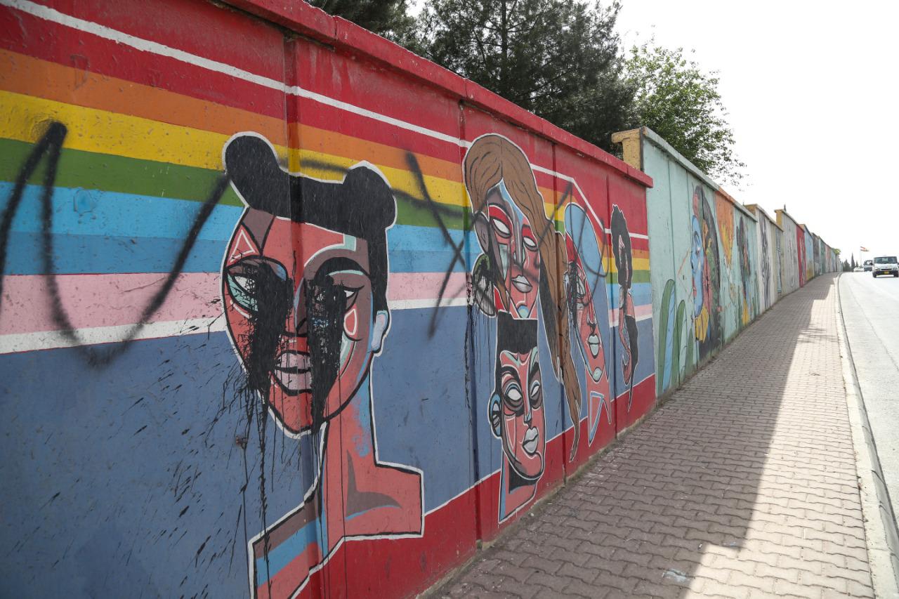 Murals near the American University of Iraq, Sulaimani on May 2, 2021. The murals, painted to encourage coexistence, have been defaced multiple times. Photo: Hama Sur