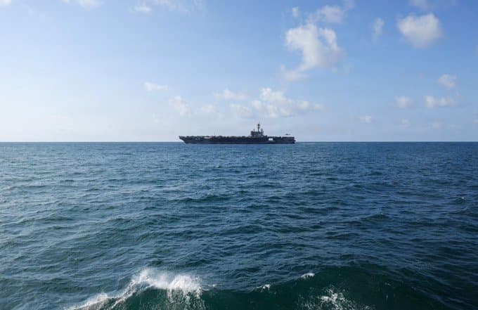 Washington deploys third aircraft carrier to Middle East as Iran continues to strike commercial vessels