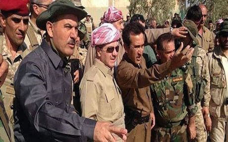 File photo of President Barzani with Peshmerga commanders in August.