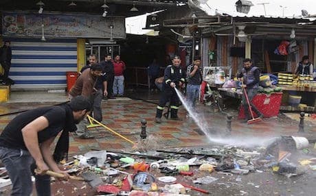 Multiple Bombings in Baghdad on Saturday killed more than three dozen people — AP Photo, Karim Kadim