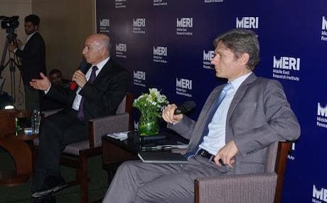Tom Malinowksi (in foreground) speaks at the MERI conference