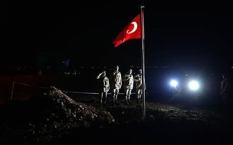 Turkey said its troops had taken control of another area in Syria where the flag had been raised and the remains would be moved. AA photo.