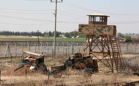 AFP file photo of Turkish vehicles guarding the border with Syria. 
