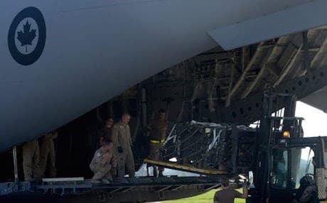 Canadian soldiers loading weapons and ammunition onto a C-17 transport place in the Czech Republic bound for the Kurdistan Region last September. AFP photo.