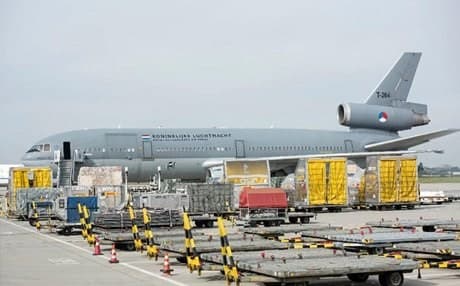 Containers with military equipment for Iraq in front of a Dutch air force plane at the airport in Leipzig, central Germany. AP file photo.