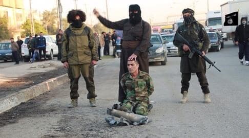 Peshmerga soldier Hujam Surchi was beheaded in Public 