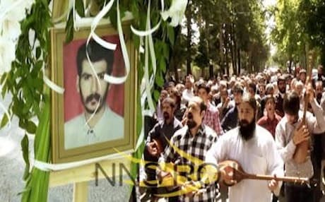 Followers of the Yarsan faith in Sahna, Kermanshah carry the picture of Nimkard Tahiri who died of his burns in hospital last week. Photo: NNSROJ