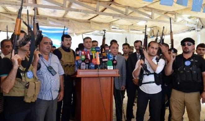 Members of the The Iraqi Turkmen Front, which has taken up arms against ISIS, seen in this AFP file photo from June 2014.