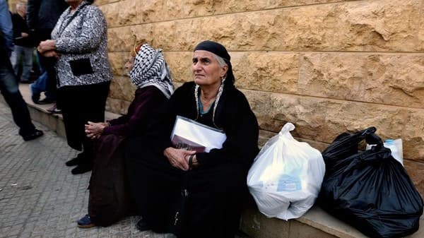 AP File Photo: Assyrian Christians fled  villages in Hassakeh last month after ISIS offensive. 