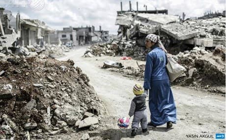 Residents of Kobane have been returning to a city that has been turned to rubble by the months of fighting. AFP photo.