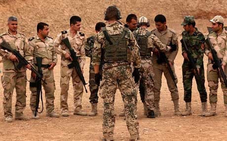 Foreign military experts instruct security forces during a training program in Iraq. AFP file photo.