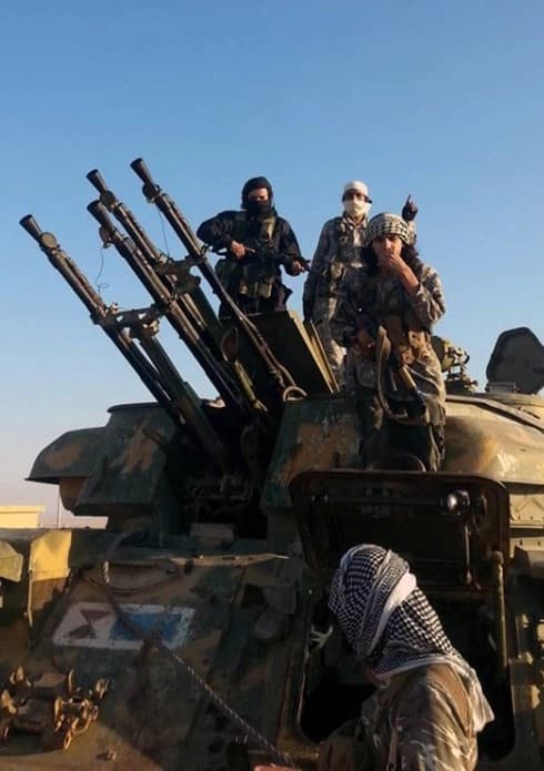 ISIS supporters in Syria. AP file photo. 