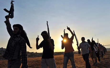 Islamic militants patrolling in Syria. AFP Photo. 