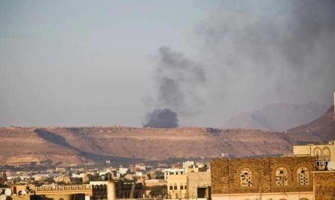 Smoke rises from an area due to Saudi-led airstrikes in Sanaa, Yemen, Monday, March 30, 2015. AP file photo. 