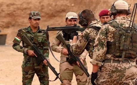 AFP file photo of German military experts seen instructing Kurdish Peshmerga fighters during training at a shooting range in Erbil.