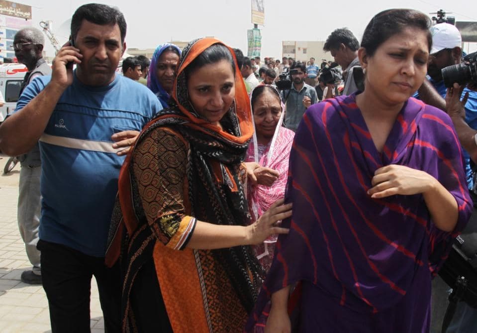 People visit a local hospital following an attack on a bus in Karachi, Pakistan, Wednesday, May 13, 2015. AP file photo. 