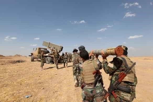 Iraqi forces fire missiles . The Guardian