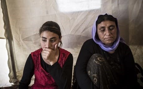 Mother and daughter recently freed from ISIS. Photo by Benjamin Haselberger.