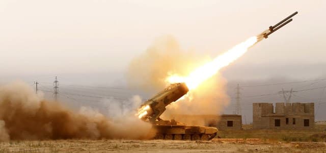 Iraqi pro-government forces fire a rocket in an operation to retake the Baiji oil refinery from Islamic State group. AFP file photo 
