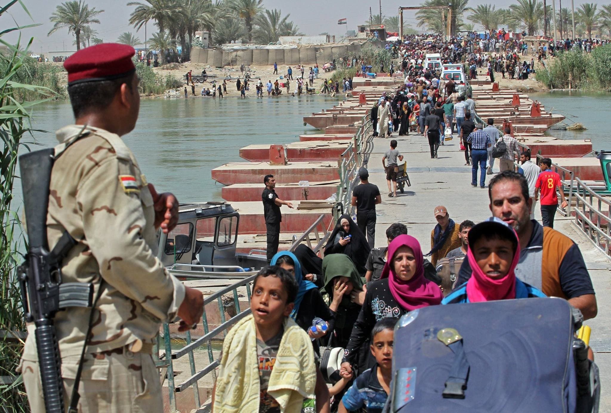 Civilians flee Ramadi hours before the fall of the city to ISIS. AFP photo