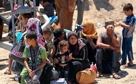 Displaced Iraqis from Ramadi flee their hometown, 65 km west of Baghdad. AP file photo