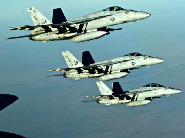US-led coalition airstrikes. AP photo. 