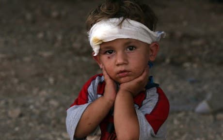 An Iraqi Yazidi child, whose family fled their home when ISIS attacked the town of Shingal. AFP photo