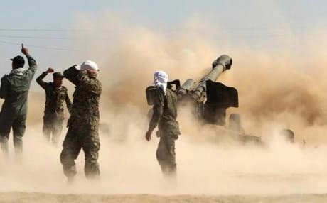 Shiite fighters, known as the Popular Mobilization units battling ISIS in Tikrit. AFP file photo