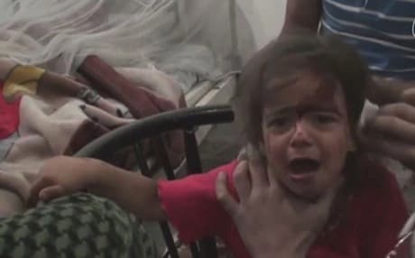 The above video contains graphic footage, including images of dead children