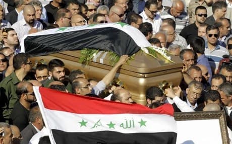 Relatives of Iraq's former foreign minister Tariq Aziz and supporters of the Baath Party in Jordan carry Aziz's coffin. AFP photo 