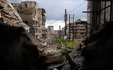 Damaged buildings are seen at al-Amriya frontline in Aleppo. AP photo