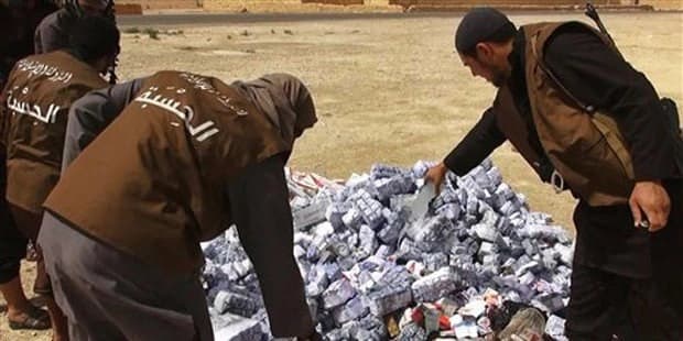 Islamic State Group's Vice Police Known As Hisba, Prepare To Burn Cigarettes And Alcohol. Photo: AP. 