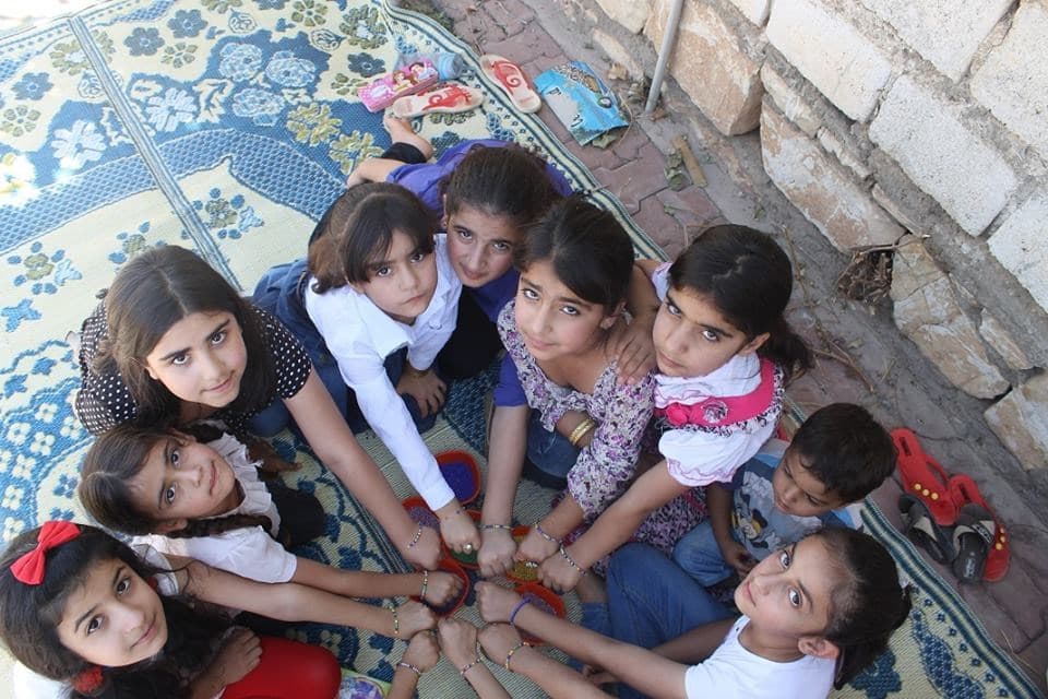 Young girls take part in peace campaign. Photos by Qayssar Rewlay