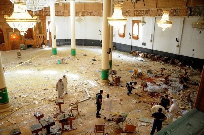 Medics and security forces inside the Imam Sadiq Mosque in Kuwait City after an attack there during midday prayers on Friday. Photo: European Pressphoto Agency.