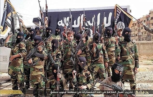 Images of child soldiers killed fighting in Syria are being shared online by the terror group as propaganda, with fellow jihadists praising the young children as martyrs. Photo: Dailymail via social media.