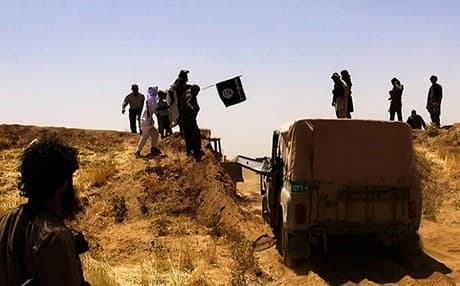 ISIS waving the trademark Jihadis near Hasaka. AFP file photo